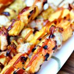Fruity Chicken Kebabs on a white platter.