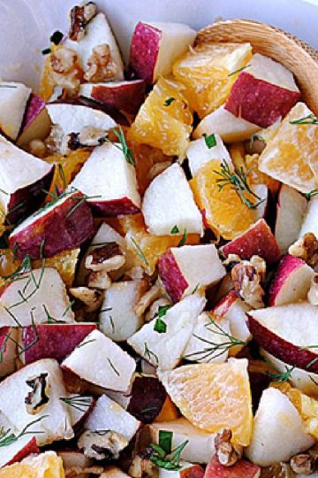 Close up image of an apple, orange and fennel salad