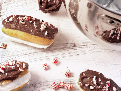 Peppermint Eclairs on a white wood board