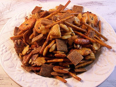 Slow Cooker Party Mix served in a white bowl