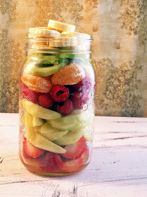 Fruit Salad in a Jar, fruit is layered inside a tall mason jar