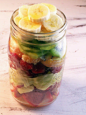 Fruit Salad in a Jar, fruit is layered in a tall mason jar