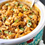 Slow Cooker Taco Pasta with fresh parsley sprinkled over top.