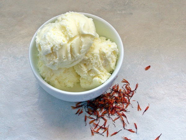 Saffron Ice Cream in a white bowl 
