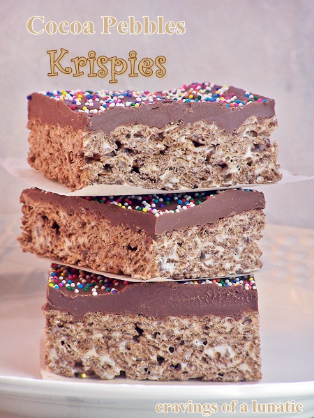Cocoa Pebbles Krispies with ganache and sprinkles! 
