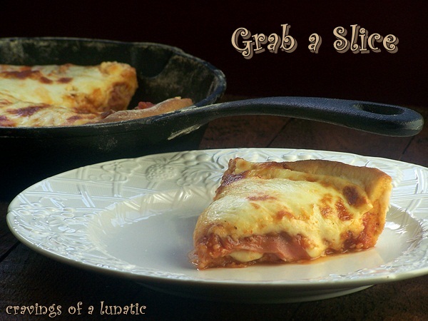 Deep Dish Pizza being served 