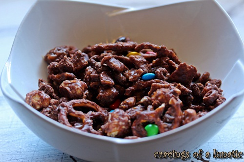 Turtle Tailgate Party Mix in a white bowl.