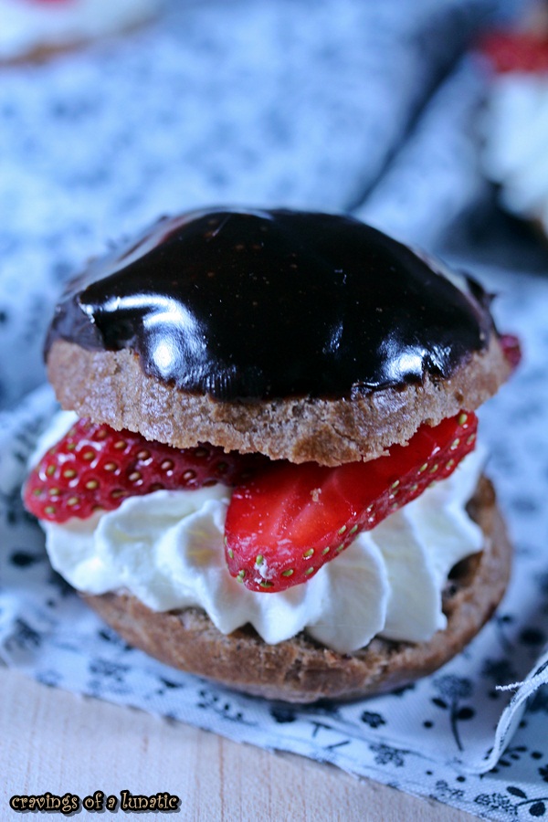 Chocolate Cream Puffs with Strawberries and Whipped Cream