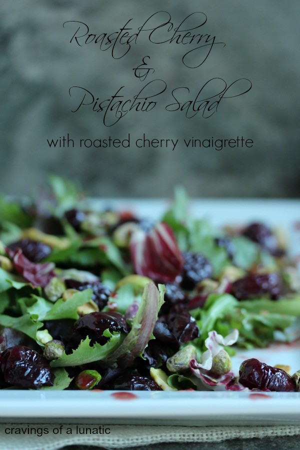 Roasted Cherry and Pistachio Salad with Roasted Cherry Vinaigrette served on a white plate