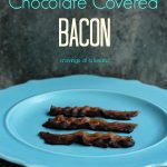 4 strips of Chocolate Covered Bacon served on a blue plate