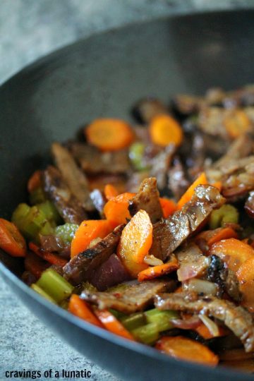 Beef Stir Fry being cooked in a wok