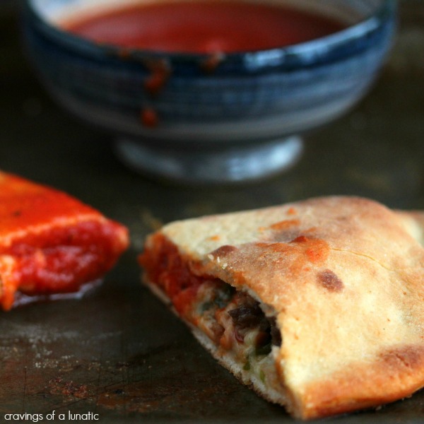 Homemade Calzones are stuffed with delicious ingredients and baked to perfection!