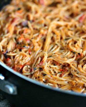 Roasted Red Pepper and Chipotle Pepper in Adobo Angel Hair Pasta in a skillet