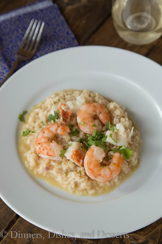 Brown Butter Seafood Risotto by Dinners, Dishes and Desserts served on a white plate.