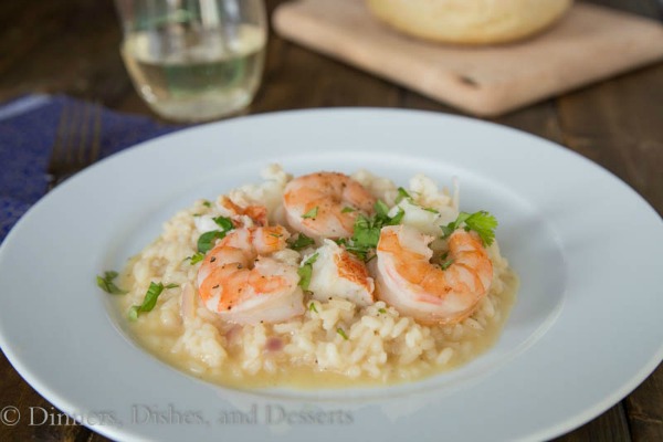 Brown Butter Seafood Risotto by Dinners, Dishes and Desserts served on a white plate.