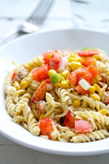 Lobster Pasta Salad in a white bowl.