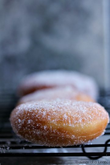 These Homemade Polish Paczki are the perfect dessert to celebrate Fat Tuesday or Mardi Gras. You can use lemon, apple, raspberry, strawberry, custard or any filling you love then dunk them in powdered sugar or glaze.  