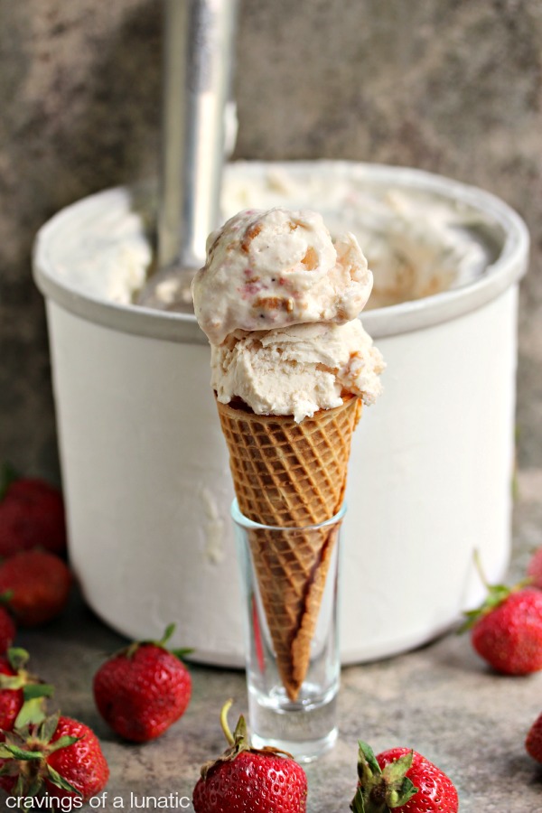 This vanilla roasted strawberry cheesecake ice cream with Biscoff bites recipe has everything you could want in an frozen dessert. It's loaded with roasted strawberries, cream cheese, and Biscoff pieces. This ice cream is beyond amazing!