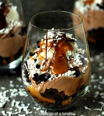 Samoa No Bake Cheesecake Parfaits | Layer upon layer of chocolate and coconut, these Samoa No Bake Cheesecake Parfaits will impress your guests.