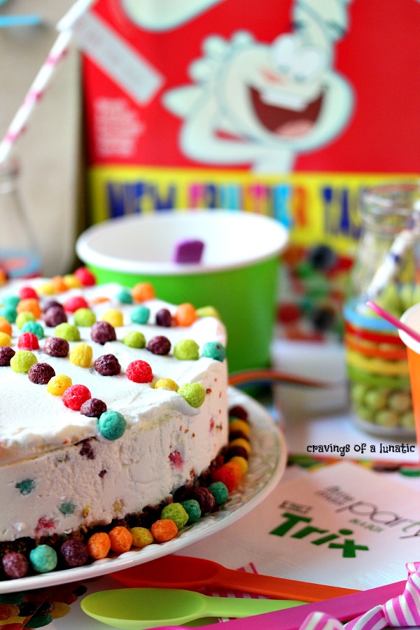 Trix Ice Cream Cake on table with cereal box in the background