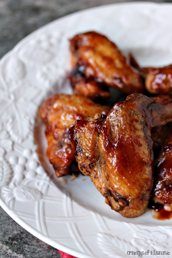 Slow Cooker Chicken Wings on a white plate.