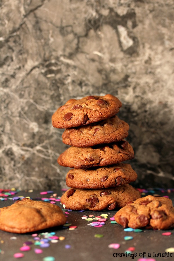 Chocolate Fudge Brownie Cookies stacked with random cookies around them.