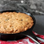 Chocolate Peanut Butter Cookie baked in a black cast iron pan