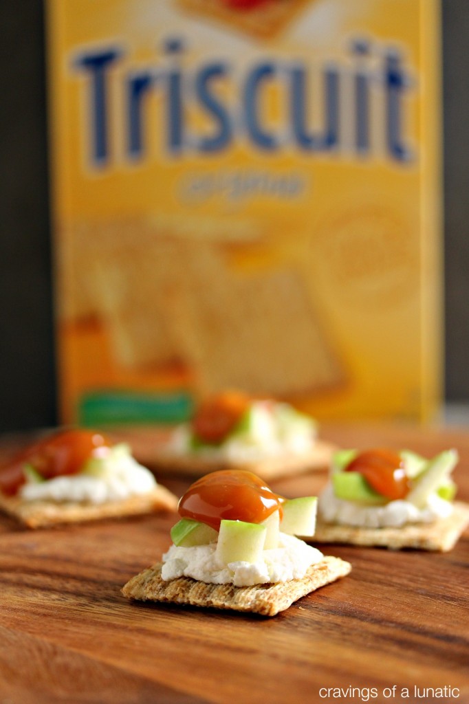 Caramel Apple Triscuit Bites- These Caramel Apple Triscuit Bites are the perfect party food. Top Triscuit Crackers with Ricotta, Apples and Caramel for sweet party bites! Get the recipe on cravingsofalunatic.com