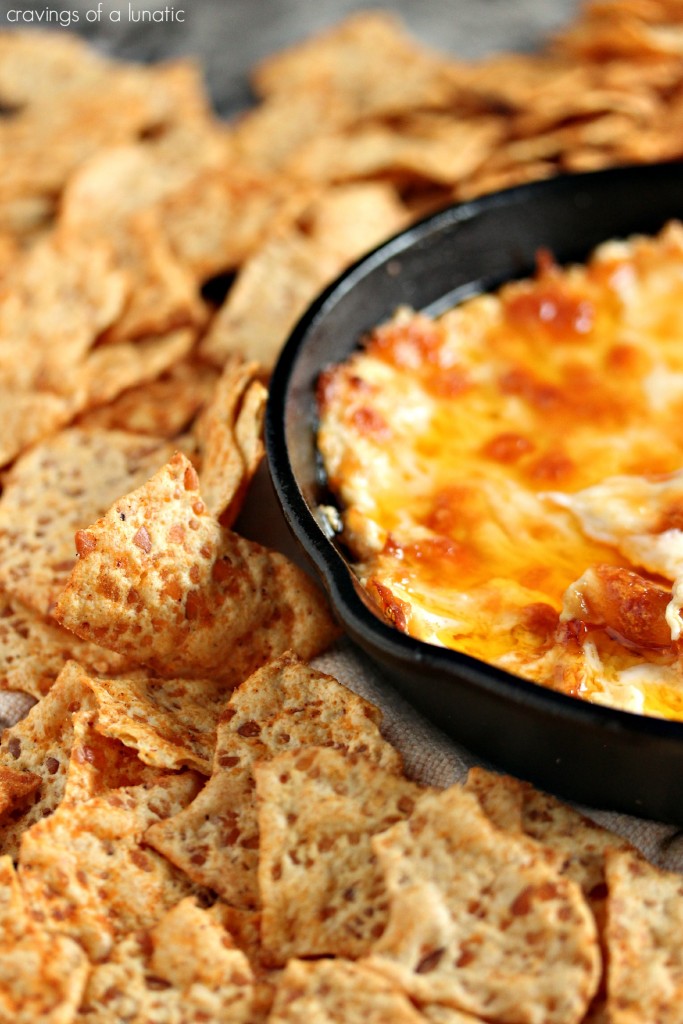 Buffalo Chicken Dip- This easy to make Buffalo Chicken Dip is sure to be a huge hit at your next gathering. Whip up a batch, or two, today! Get the recipe at cravingsofalunatic.com