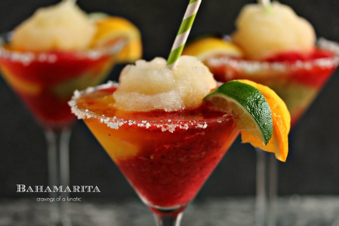 close up image of three glasses of frozen margarita made with Tequila, kiwi, strawberry and mango ices and served with a shot of Cactus Juice Schnapps
