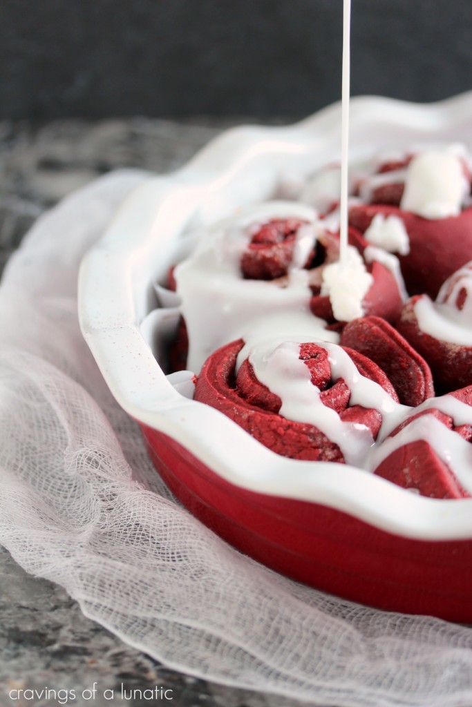 Red Velvet Sweet Rolls with an extra drizzle of icing. 