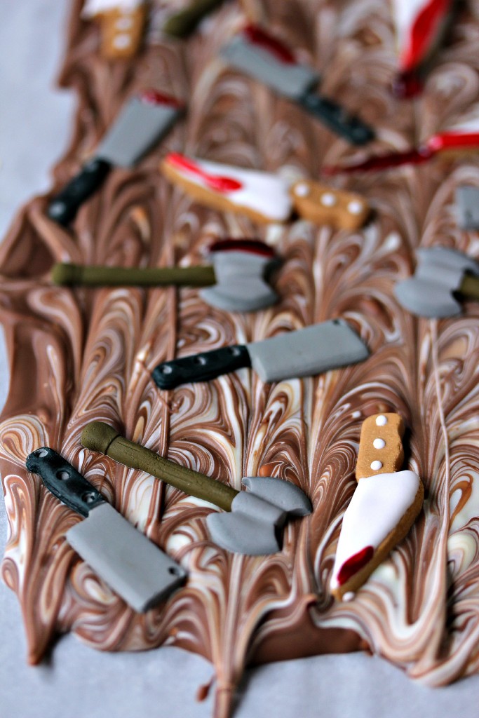 Chocolate Weapons Bark in one giant slab on a pan covered in parchment paper.