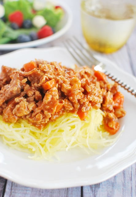 Spaghetti Squash Bolognese served on a white plate