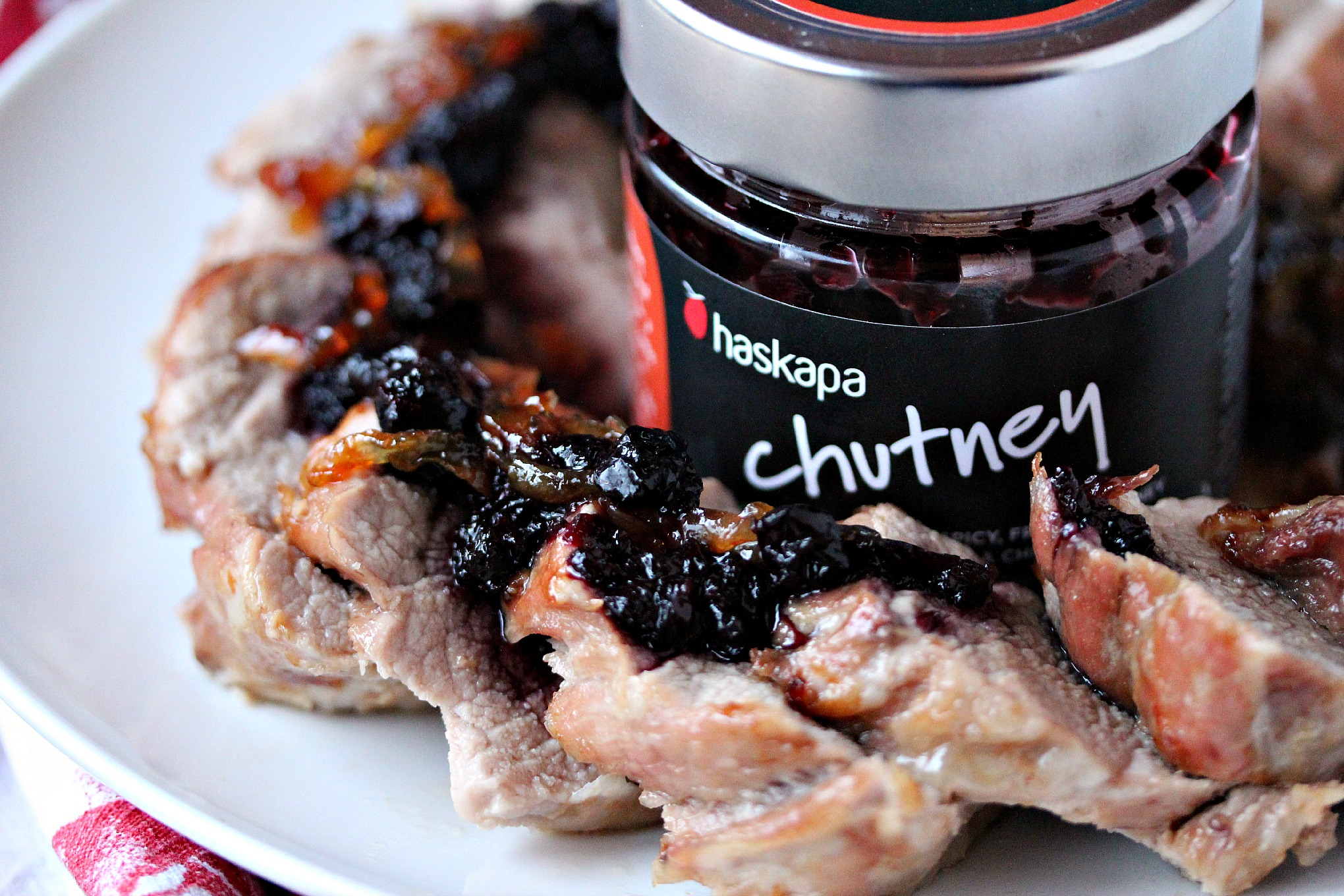 Pork Tenderloin with Haskapa Chutney from cravingsofalunatic.com- This recipe for pork tenderloin uses a dry rub, then it's cooked to perfection, and topped with Haskapa Chutney. The flavour of this one is out of this world. (@CravingsLunatic)