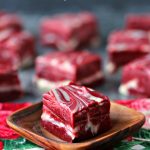 This 4 Ingredient Red Velvet Swirl Fudge is perfect for any occasion. Nothing beats an easy to make fudge recipe during the holidays, especially one that looks so impressive. This might look hard but it's incredibly easy, quick and absolutely delicious!