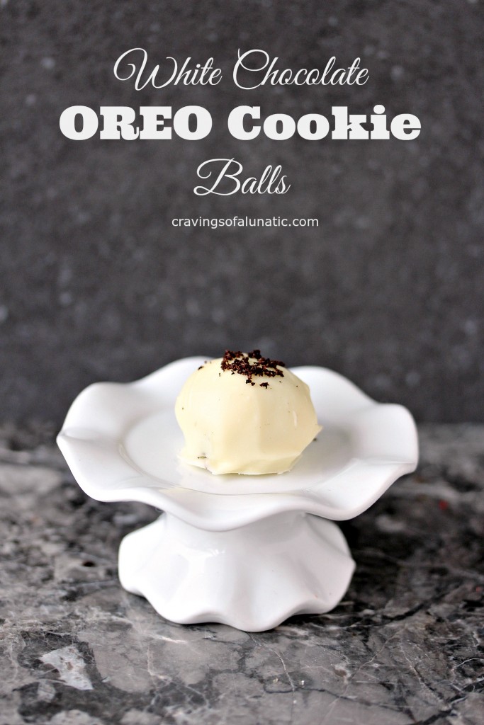 White Chocolate OREO Cookie Balls served on a miniature white cake stand.