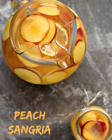 Peach Sangria served in a glass pitcher and mason jar