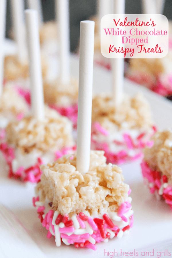 Valentine’s White Chocolate Dipped Krispy Treats from High Heels and Grills served on a white plate