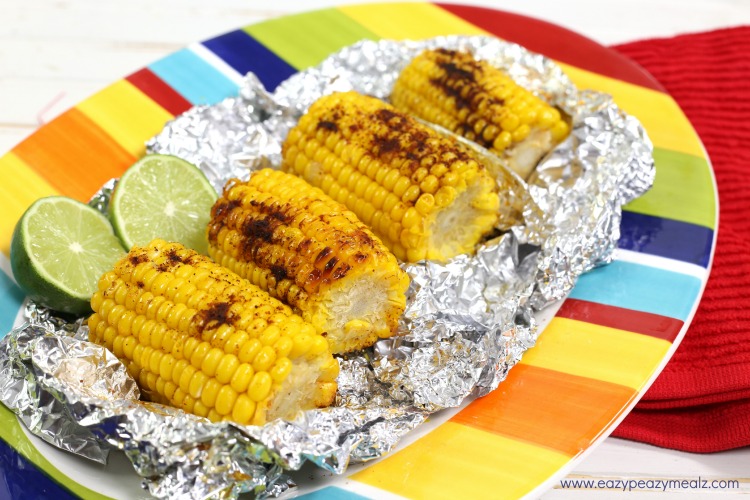 Slow Cooker Mexican Street Corn – Eazy Peazy Mealz image of finished recipe on a brightly coloured plate. 