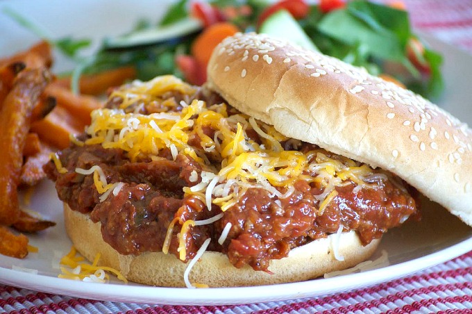 Slow Cooker Sloppy Joes – 365 Days of Baking and More image of finished recipe on a white plate. 