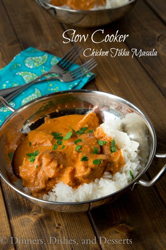 Slow Cooker Tikka Masala from Dinners, Dishes, and Desserts photo of recipe in a pan on a wood table. 