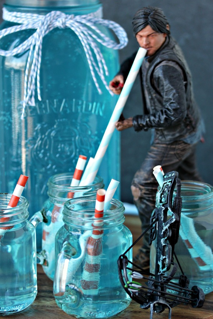 Daryl Dixon figurine holding a straw so it looks like he's drinking toilet water.