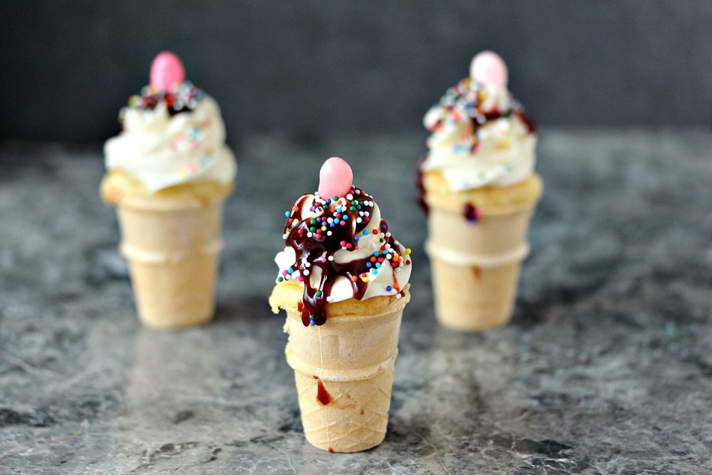 Mini Ice Cream Cone Cupcakes on grey granite counter.