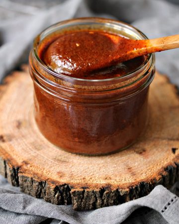 Easy Homemade Enchilada Sauce served in a mason jar
