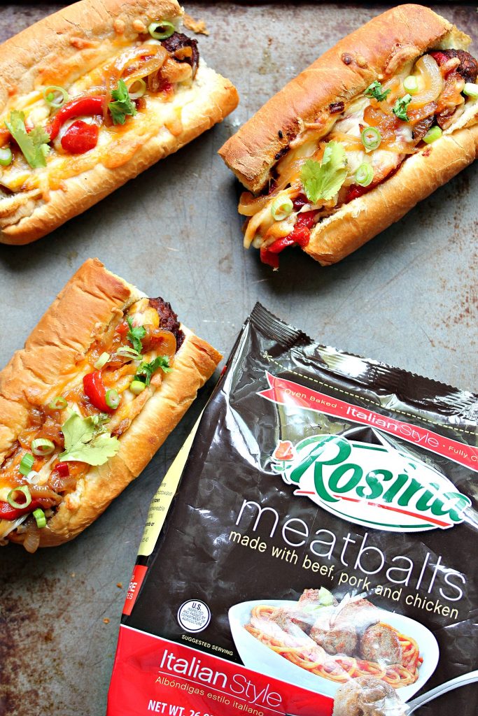 The Tex Mex Meatball Sub is perfect for any occasion. Mini sub buns are stuffed with meatballs smothered in enchilada sauce, topped with roasted red peppers, caramelized onions and a Mexican 4 Cheese Blend. 