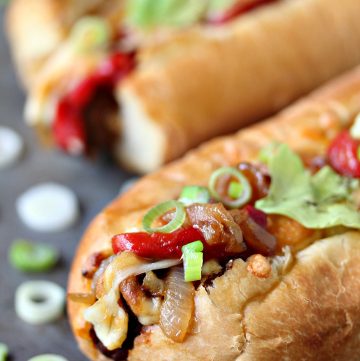The Tex Mex Meatball Sub is perfect for any occasion. Mini sub buns are stuffed with meatballs smothered in enchilada sauce, topped with roasted red peppers, caramelized onions and a Mexican 4 Cheese Blend.