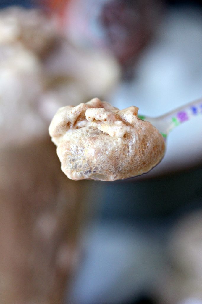 Close up image of root beer float scooped onto a spoon