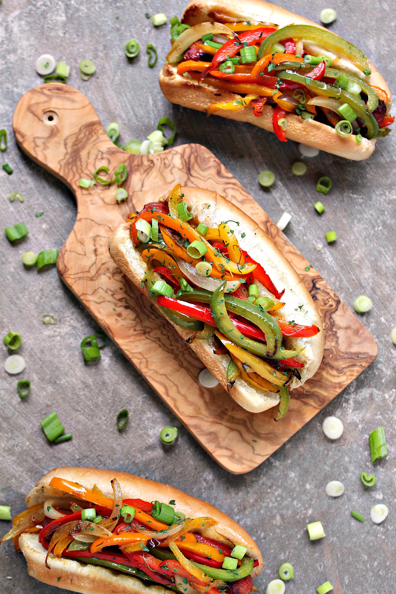 Grilled Fajita Hot Dogs from cravingsofalunatic.com- Grilled Hot Dogs topped with grilled bell peppers and onions. This recipe is incredibly easy to make, yet bursting with flavour. Be a legend at your grill this summer! (@CravingsLunatic)