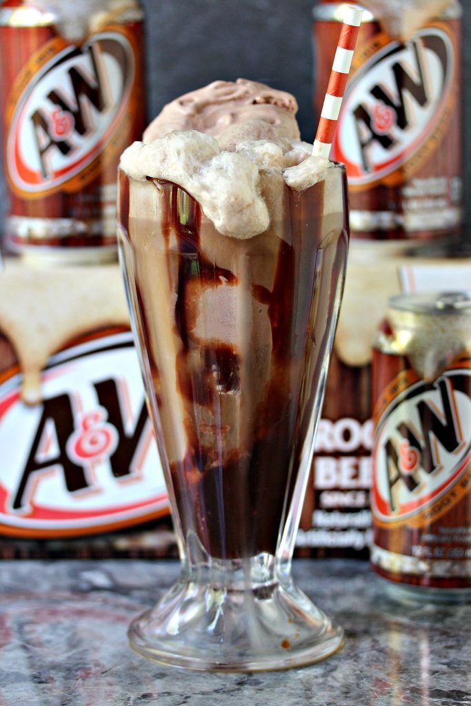 Chocolate Hot Fudge Root Beer Float in a milkshake glass with a red and white straw.