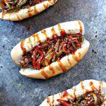 Grilled Bacon-Wrapped Beer Brats with Drunken Peppers and Onions